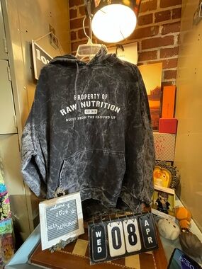 Raw Nutrition brand gray mineral wash pullover hoodi "Property of Raw Nutrition"